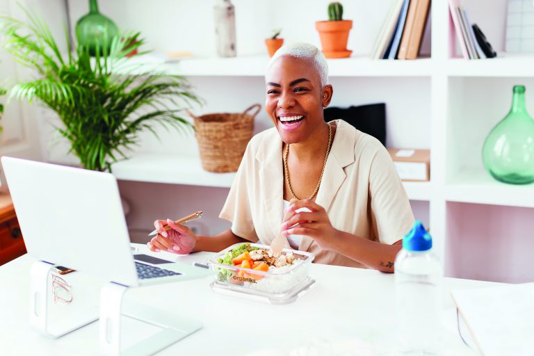 Happy African American Manager Having Healthy Lunch In Office
